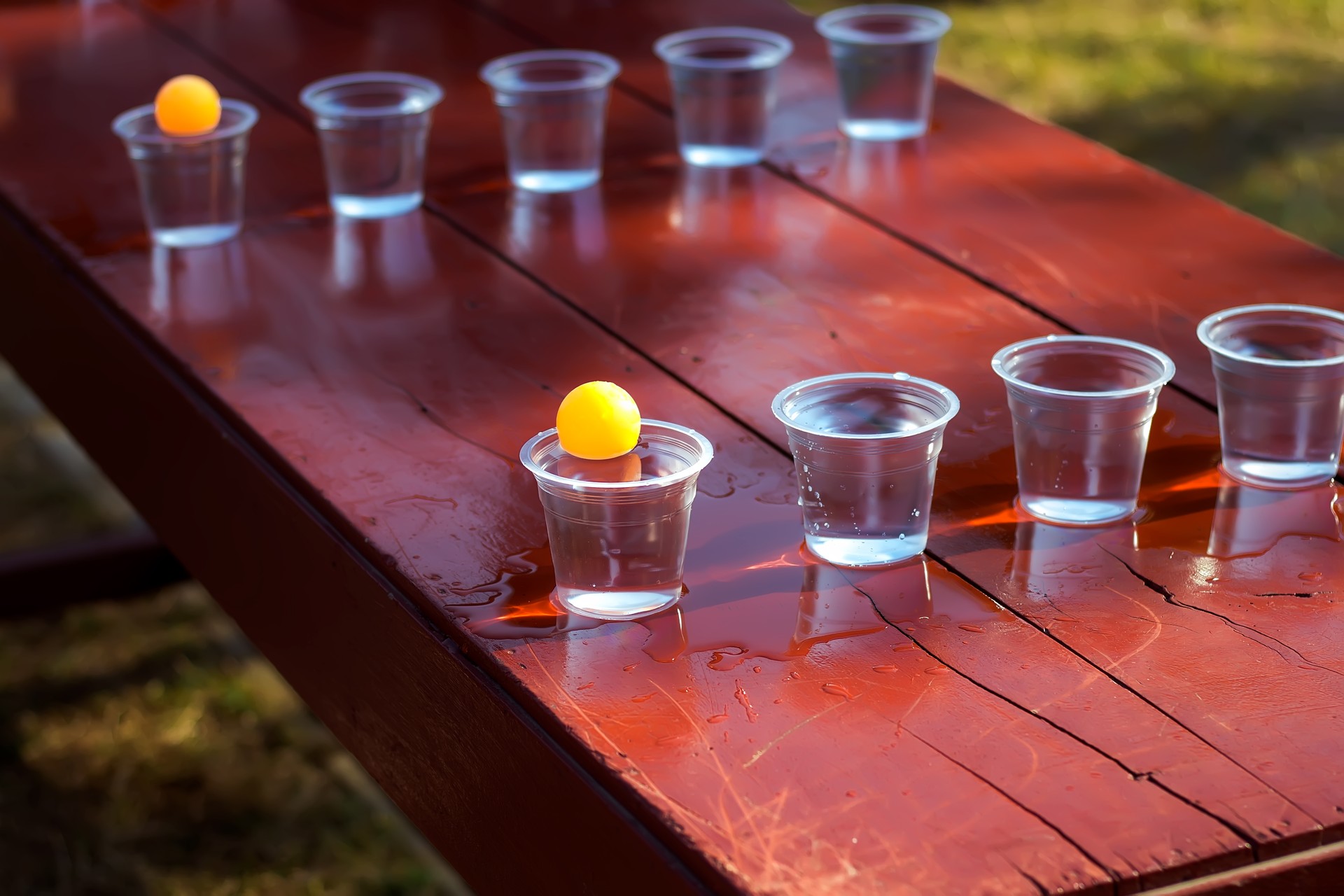 Ping pong ball with water and cup